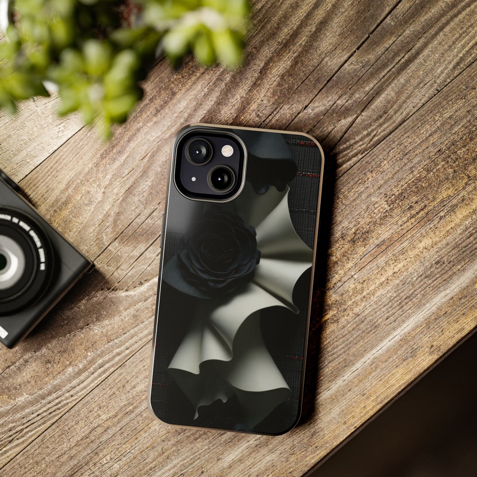 The black roses add a gothic edge to the otherwise neutral and soft composition.