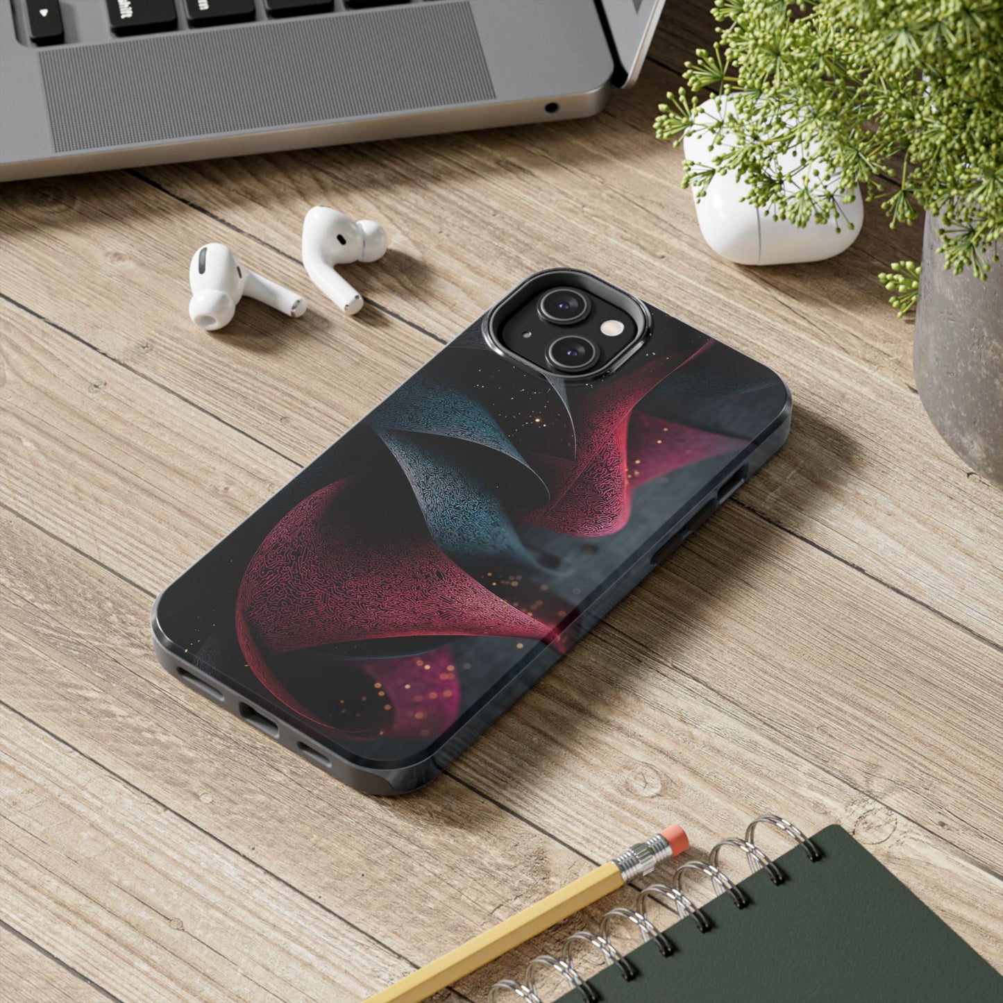 A lifestyle image shows the phone case as a statement piece for lovers of abstract style.