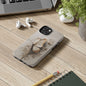 Elegant sculptural phone case in soft ivory tones